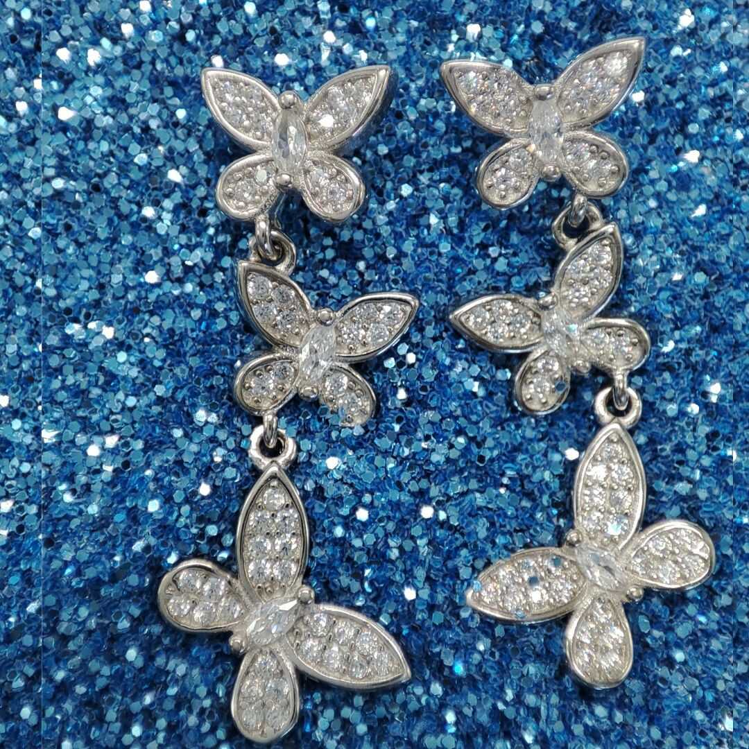 Aretes de plata largos tres mariposas – Destello