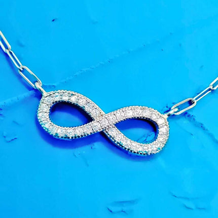Collares. Collares de plata. Collares plata. Collares para mujer. Collares pandora. Collares tous. Collar con dije. Collares moda 2024. Collares 2024. Collar para vestido. Collar con vestido. Collar de plata infinito con zirconia. Zirconia. Regalo para mi novia. Collares de graduación. Collares para graduación. Collar para XV años. Infinito. Plata esterlina. Plata ley 925. Plata pura. Plata 925.
